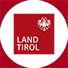 LAND TIROL. Das logo für land tirol ist ein rotes quadrat mit einem weißen kreis darum herum.